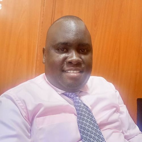 Dr Charles Muweesi S